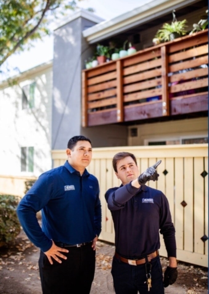 Vanish technicians performing termite inspection